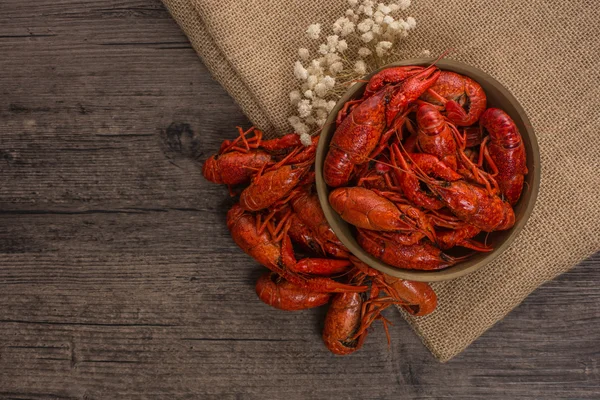 Boiled big crawfish on the wooden surface — Stock Photo, Image