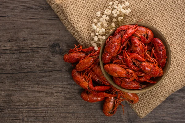 Boiled big crawfish on the wooden surface — Stock Photo, Image