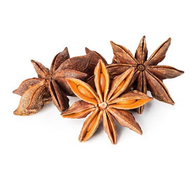 Star anise spice fruits and seeds isolated on white background clipart