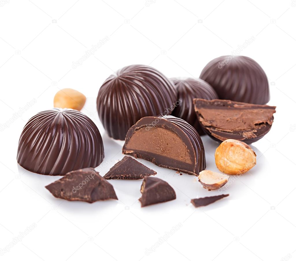 Chocolate candies close-up isolated on a white background.