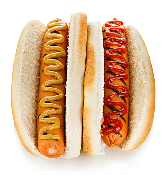 Big tasty appetizing Hot dogs close-up isolated on a white background. Fastfood. — Stockfoto