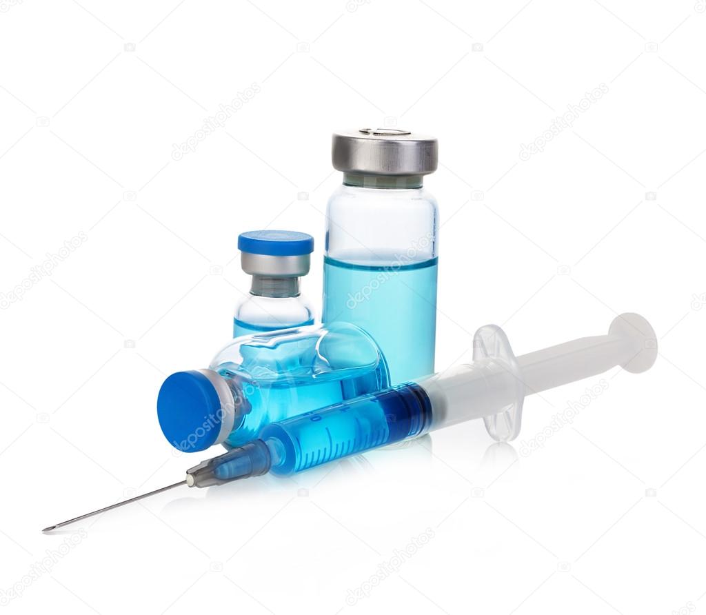 medical vial with blue medication solution.