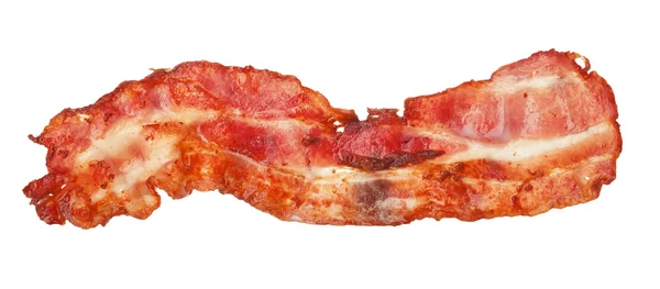 Cooked bacon strip close-up isolated on a white background. — Stock Photo, Image