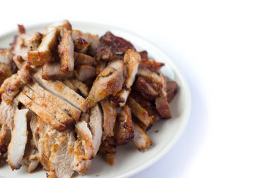 Tayland usulü tuzlu, biberli, sarımsaklı ve yağlı ızgara domuz pirzolası.