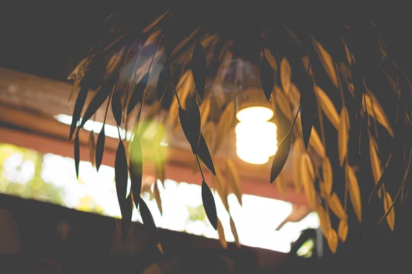 Handgjord lampa råvaror genom bamboo väv — Stockfoto