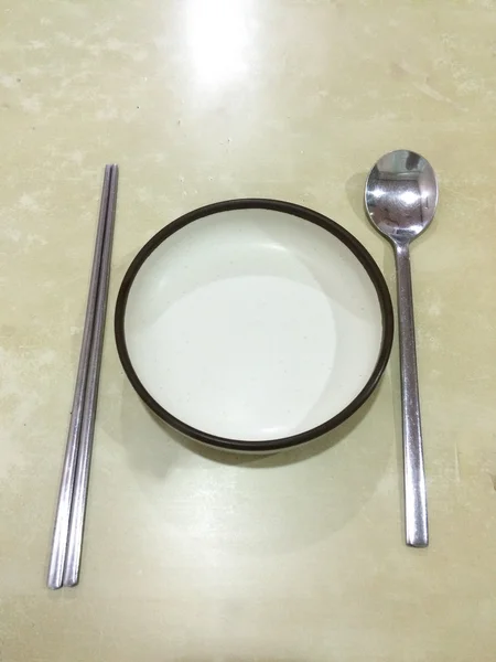 Chopsticks e prato e colher . — Fotografia de Stock