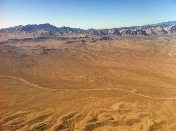 Desert kilátás a repülőgépről. — Stock Fotó