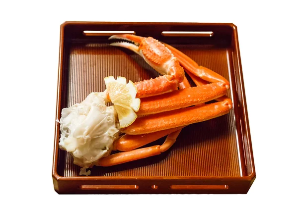 Isolated king crab leg in plate.With clipping path. — Stock Photo, Image