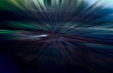 Hızlanma hareketi var. Işık ve çizgiler koyu arkaplanda hızla hareket ediyor