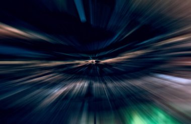 Hızlanma hareketi var. Işık ve çizgiler koyu arkaplanda hızla hareket ediyor