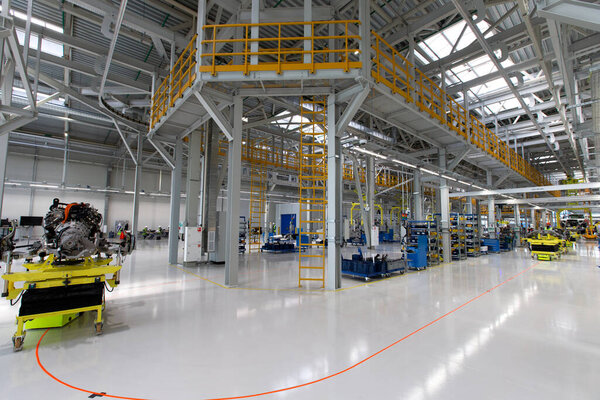 auto plant, car assembly workshop. Main conveyor. Selective focus