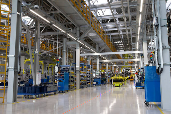 auto plant, car assembly workshop. Main conveyor. Selective focus