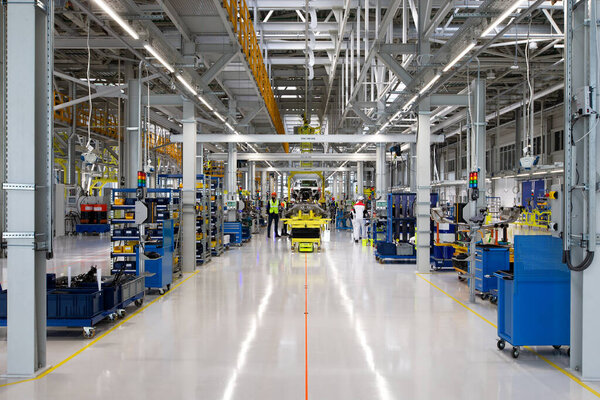 auto plant, car assembly workshop. Main conveyor. Selective focus