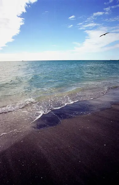 Calm beach with waves