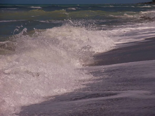 Calm beach with waves