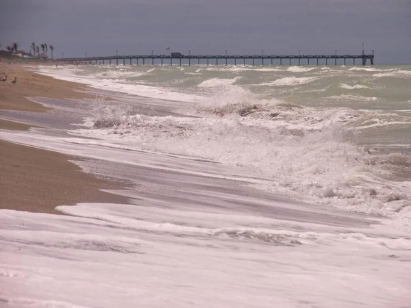 Calm beach with waves