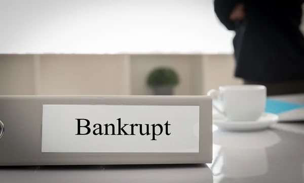 Bankrupt, closeup bankrupt file on desk — Stock Photo, Image