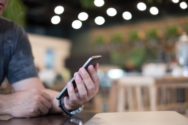 man using smart phone device for text message cellphone or connect social network