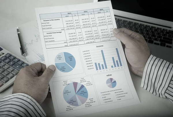 businessman analyzing data report
