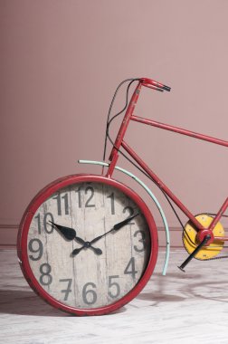 wall clock built into the bicycle wheel  clipart