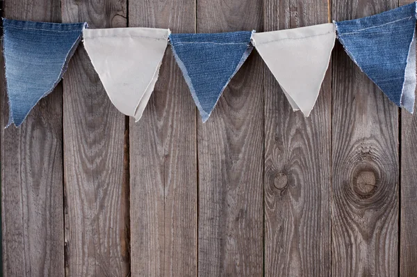 Garland farklı tonları denim bayrakları ile metin için yer — Stok fotoğraf