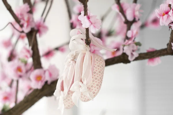 Pink baby booties with bow ribbon — Stock Photo, Image