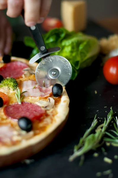 Homemade hot pizza with  salami, bacon, broccoli — Stock Photo, Image