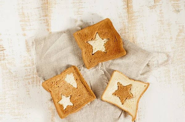 Christmas breakfast. Slice toast bread on wooden boards. — Stock Photo, Image