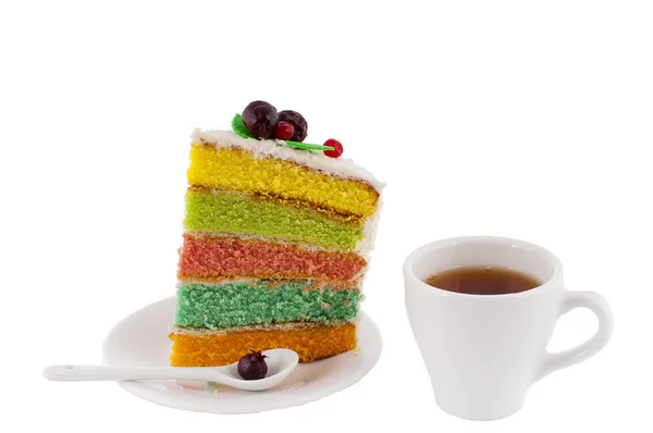 上のカップに果実で飾られたカラフルなケーキ — ストック写真