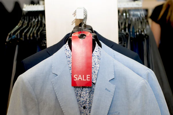 Light jacket with a shirt on a hanger — Stock Photo, Image