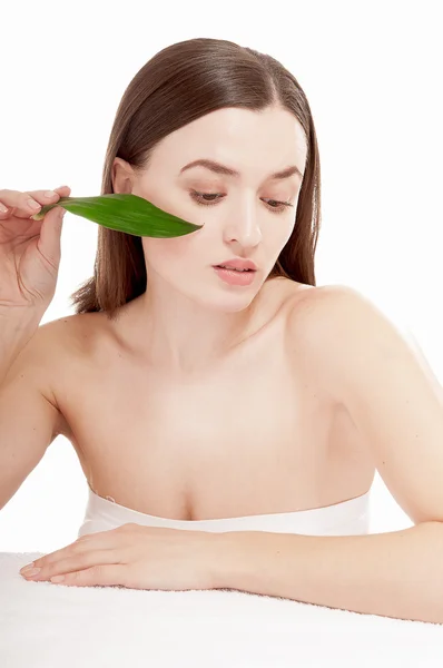 Woman with well-groomed skin near organic cosmetics — Stock Photo, Image