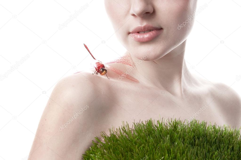 Spring happy girl with dragonfly