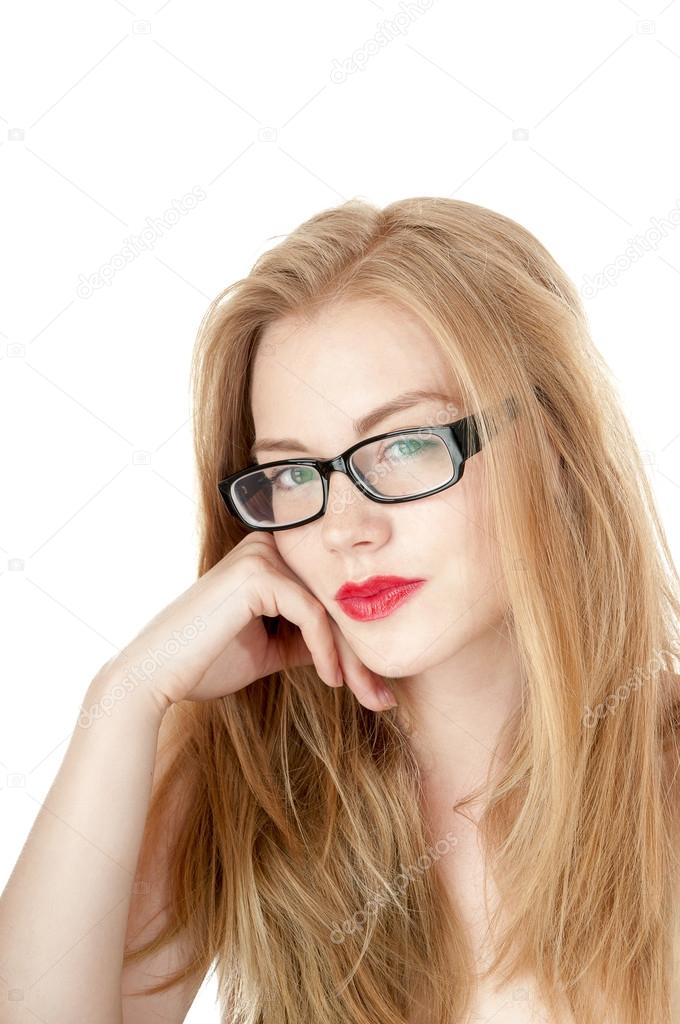 Portrait of beautiful young girl in glasses