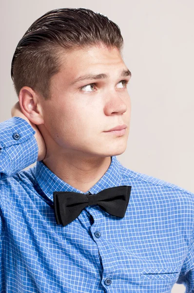 Perfil de gallant man in the blue shirt with black bow tie — Fotografia de Stock