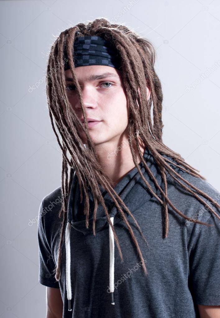 Young stylish guy with dreadlocks
