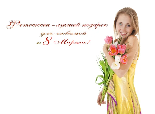 Portrait of a happy smiling  girl with a bouquet of spring tulips — Stok fotoğraf