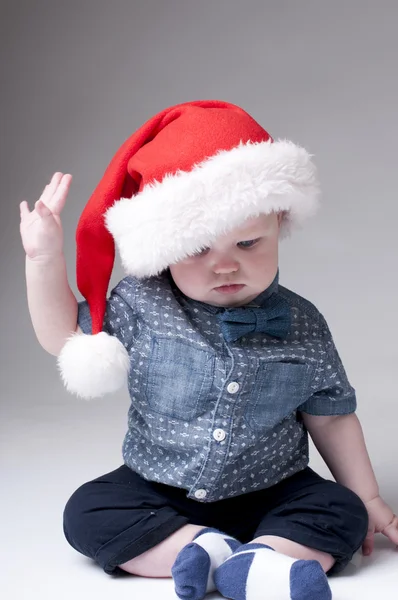 Baby boy viselt santa kalap — Stock Fotó