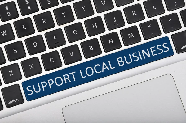 Tlačítko klávesnice napsal slovo podpora místního podnikání — Stock fotografie