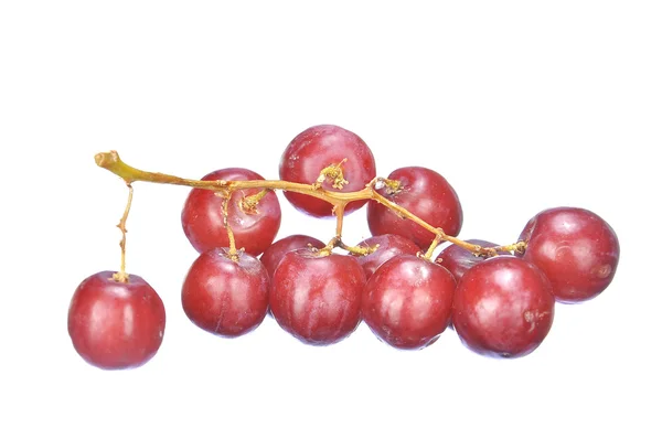 Lezzetli demet kırmızı çekirdeksiz kırmızı üzüm beyaz izole — Stok fotoğraf