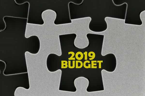 The black jigsaw puzzle written word 2019 budget — Stock Photo, Image