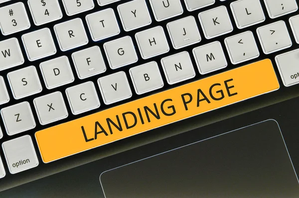 Przycisk klawiatury napisane słowo lądowania strony — Zdjęcie stockowe