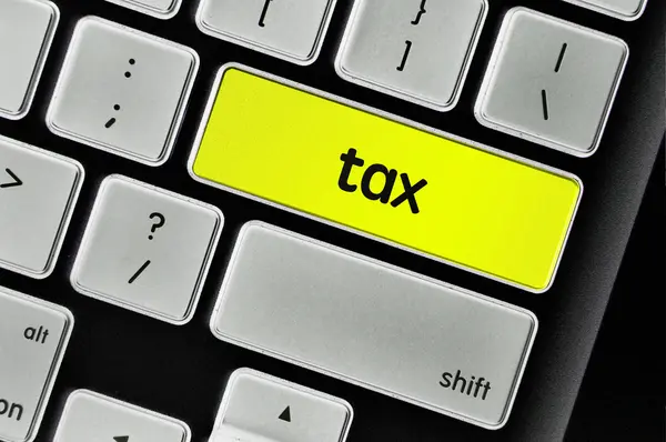 Tlačítko klávesnice napsal slovo daň — Stock fotografie