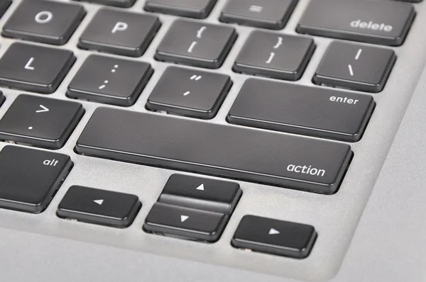 The computer keyboard button written word action — Stock Photo, Image