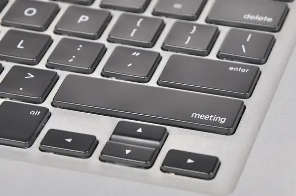 The computer keyboard button written word meeting — Stock Photo, Image