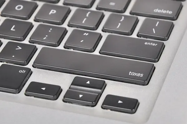 Keyboard  button written word taxes — Stock Photo, Image