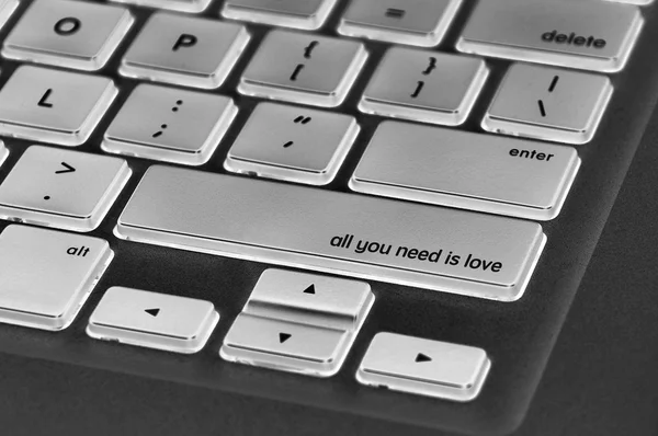 Teclado botón palabra escrita todo lo que necesita es amor — Foto de Stock
