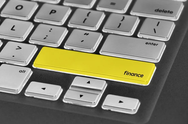 The computer keyboard button written word finance — Stock Photo, Image