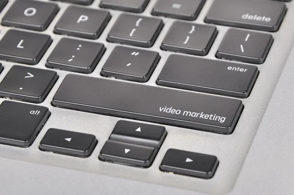 Кнопка компьютерной клавиатуры письменного видео маркетинга — стоковое фото
