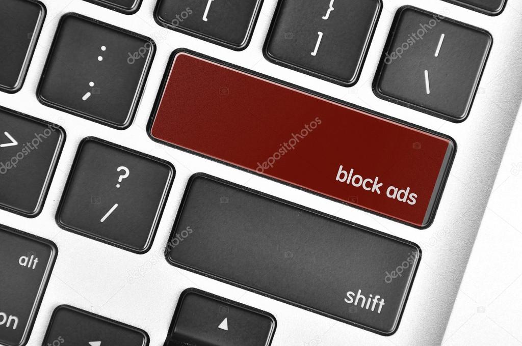The computer keyboard button written word block ads