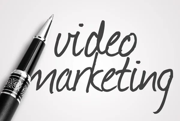 Bolígrafo escribe video marketing en papel — Foto de Stock